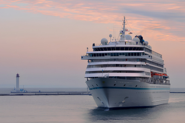Cruise ship docked at Southampton port for passenger transfer services